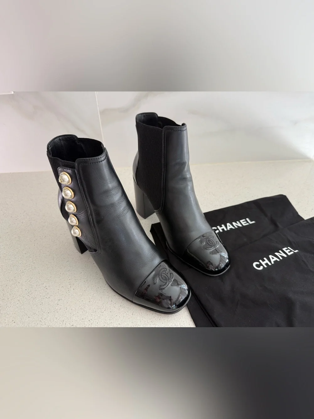 CHANEL  Coco Mark Faux-Pearl Black Leather Ankle Boots